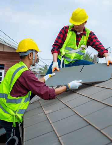 Employee pg intro 369x475 2 men installing a shingle to a roof